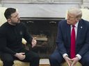 President Donald Trump, right, meets with Ukrainian President Volodymyr Zelenskyy in the Oval Office at the White House, Friday, Feb. 28, 2025, in Washington. (AP Photo/ Mystyslav Chernov)