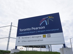 A sign for Toronto Pearson International Airport is pictured in Mississauga,