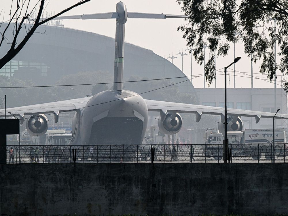 NextImg:India vows to 'crackdown' on illegal migration as over 100 people sent home on U.S. aircraft