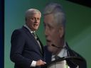 Former prime minister Stephen Harper delivers the keynote address at a conference in Ottawa, Wednesday, March 22, 2023.
