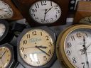 FILE: A selection of vintage clocks are displayed at Electric Time Company, Tuesday, Nov. 1, 2022, in Medfield, Mass.