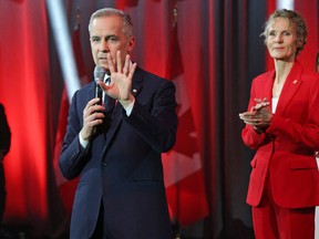 Mark Carney, new Liberal leader and wife Diana Carney