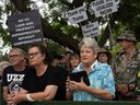 White South Africans demonstrate in support of U.S. President Donald Trump in front of the U.S. embassy in Pretoria, South Africa, Feb. 15, 2025.