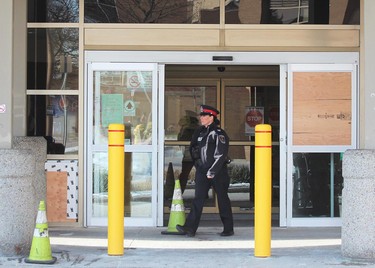 Sgt. Sandasha Bough leaves the emergency room at Victoria Hospital where police are investigating an overnight shooting on Saturday, December 14, 2024.
