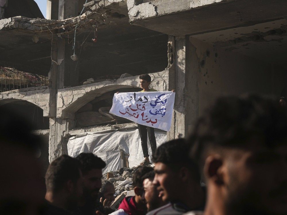 NextImg:Gazans call for end of Hamas rule at funeral for protester allegedly executed