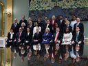 Prime Minister Mark Carney, Gov. Gen. Mary Simon and members of the Liberal cabinet for a photo after a swearing in ceremony at Rideau Hall in Ottawa on Friday, March 14.