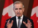 Canadian Prime Minister Mark Carney spoke with the media after meeting with the cabinet and dealt with U.S. automatic tariffs on March 27, 2025.