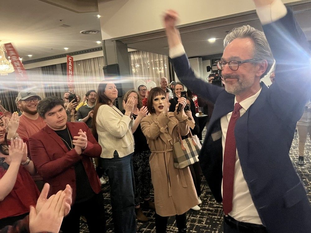  Liberal David Myles celebrates his victory in the federal riding of Fredericton-Oromocto on Monday. The Juno-winning singer-songwriter defeated Conservative candidate Brian Macdonald, the former Fredericton area MLA. Photo: John Chilibeck/Brunswick News