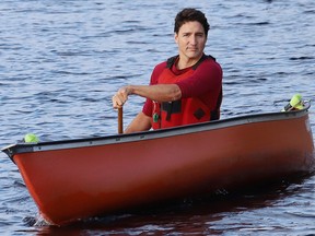 Justin Trudeau paddling a canoe