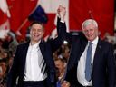 Conservative Party leader Pierre Poilievre is introduced by former Prime Minister Stephen Harper during a campaign rally in Nisku (just south of Edmonton) Monday April 7, 2025.