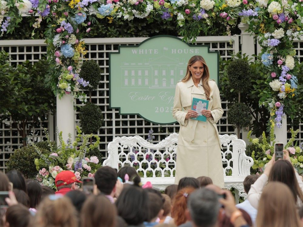  First Lady Melania Trump reads to children during the White House Egg Roll on the South Lawn of the White House on April 21, 2025 in Washington, DC.