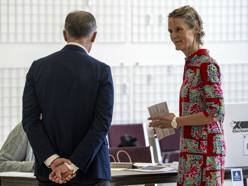 Canadian Prime Minister Mark Carney and his wife, Diana Fox Carney, wait to cast their vote on Election Day on April 28, 2025 in Ottawa, Canada. Canadian Prime Minister Mark Carney and his wife, Diana Fox Carney, wait to cast their vote on Election Day on April 28, 2025 in Ottawa, Canada.