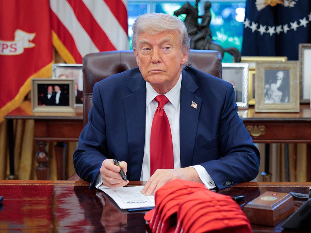 NextImg:Trump says automobile tariffs on Canada could increase but suggests deal is in the works