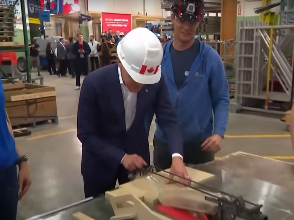  Liberal Leader Mark Carney puts his fingers at risk for a photo-op as tries his hand at woodworking during a campaign stop on March 31.