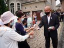 Paul Chiang, the incumbent MP for the Toronto-area riding of Markham-Unionville, is seen canvassing for the 2021 federal election. Chiang withdrew his candidacy for this month's election after comments surfaced of him suggesting someone turn in a candidate for the Conservative party, who has a bounty on his head in China due to his criticism of human rights abuses there.