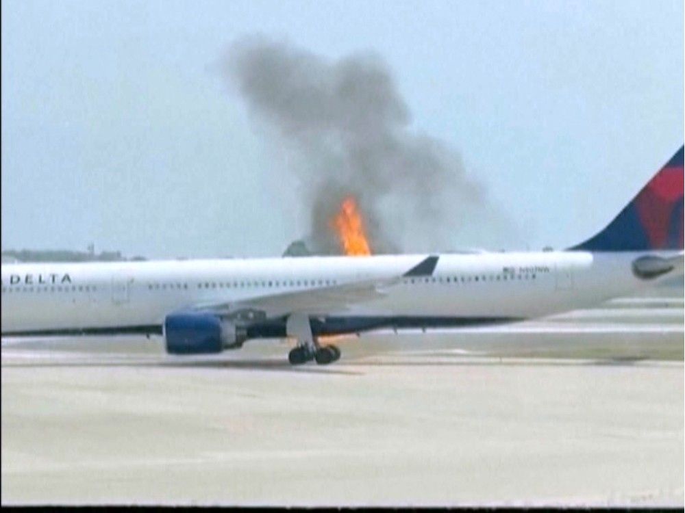 NextImg:Delta plane catches fire at Orlando airport, forcing passenger evacuations