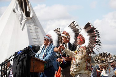 From left, Chief Bart Tsannie, Grand Chief Brian Hardlotte and Vice-Chief Christopher Jobb speak at the James Smith Cree Nation on Sept. 8, 2022, a few days after Myles Sanderson went through the community attacking whole families, killing 11. He had a history of violent offences and secured early release from prison a year before.