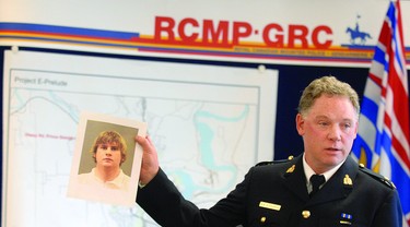In October 2011, RCMP Insp. Brendan Fitzpatrick, E Division Major Crime holds up the photo of 21 year old Cody Alan Legebokoff charged with 3 counts of first degree murderin the murders of Jill Stacey Stuchenko, Cynthia Frances Maas and Natasha Lynn Montgomery.