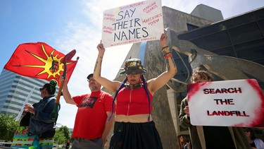 People outside the Manitoba Law Courts in Winnipeg call for the government to search the landfills as closing arguments in the Jeremy Skibicki trial were being made inside on Mon., June 10, 2024.