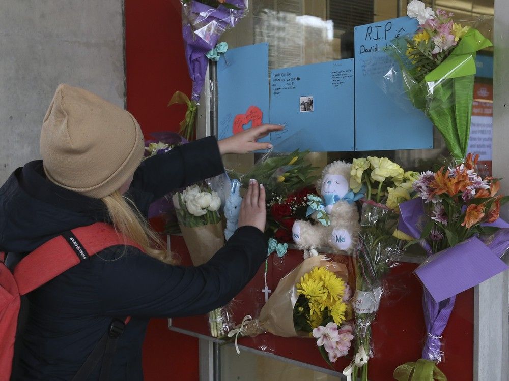  Sofia Barysh, a university student at Toronto Metropolitan University (Ryerson) places flowers at the memorial for murder victim Gabriel Magalhaes, 16 who was stabbed to death, in an unprovoked attack at Keele TTC station.