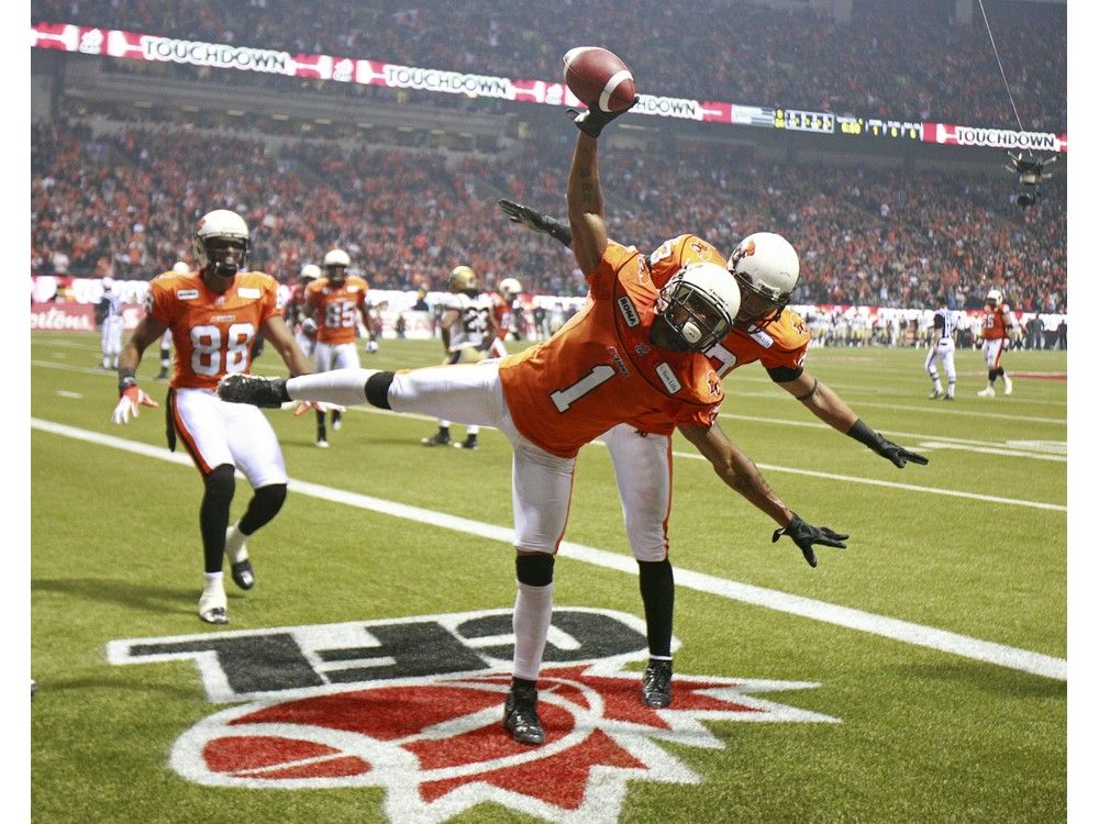 Arland Bruce #1 and Andrew Harris #33 of the BC Lions celebrate fourth-quarter touchdown against the Winnipeg Blue Bombers during the CFL Grey Cup game at BC Place in Vancouver, Nov. 27, 2011. Arland Bruce #1 and Andrew Harris #33 of the BC Lions celebrate fourth-quarter touchdown against the Winnipeg Blue Bombers during the CFL Grey Cup game at BC Place in Vancouver, Nov. 27, 2011.