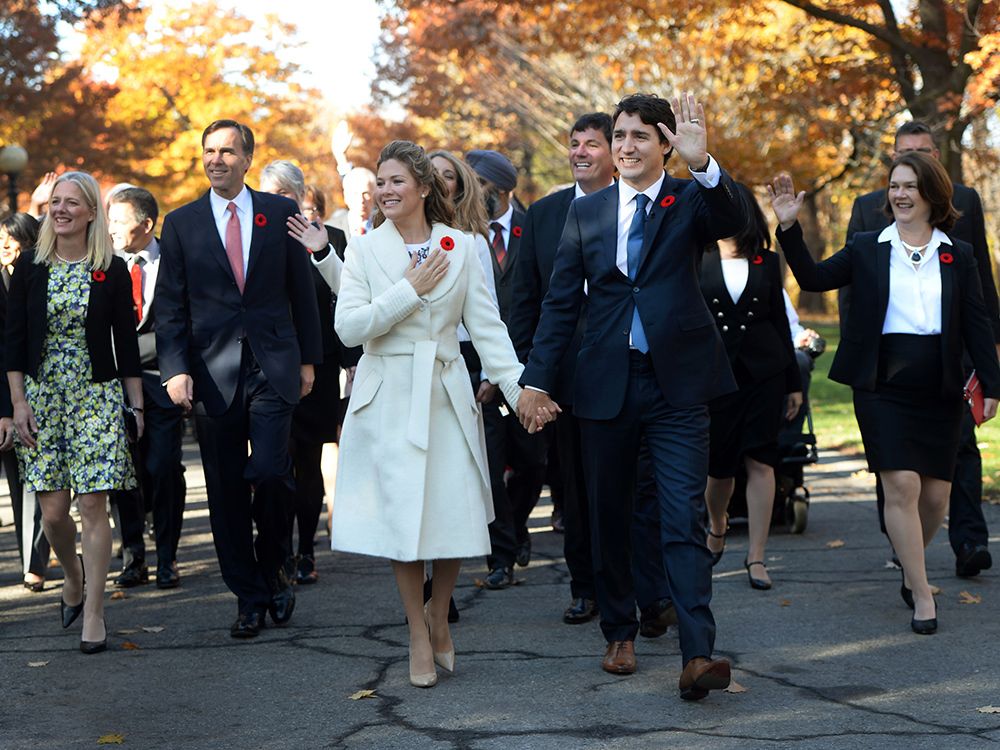  Prime Minister-designate Justin Trudeau and Sophie Gregoire-Trudeau walk to Rideau Hall with members of Trudeau’s future cabinet to take part in a swearing-in ceremony, Nov. 4, 2015.