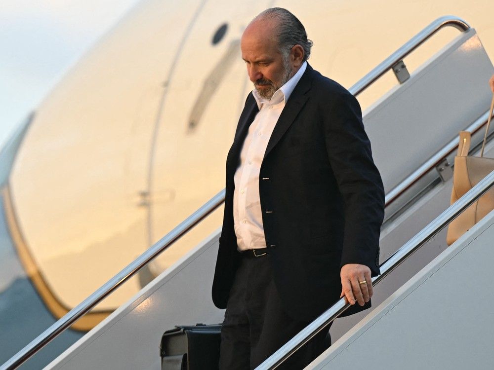 U.S. Secretary of Commerce Howard Lutnick disembarks from Air Force One on May 4, 2025. U.S. Secretary of Commerce Howard Lutnick disembarks from Air Force One on May 4, 2025.
