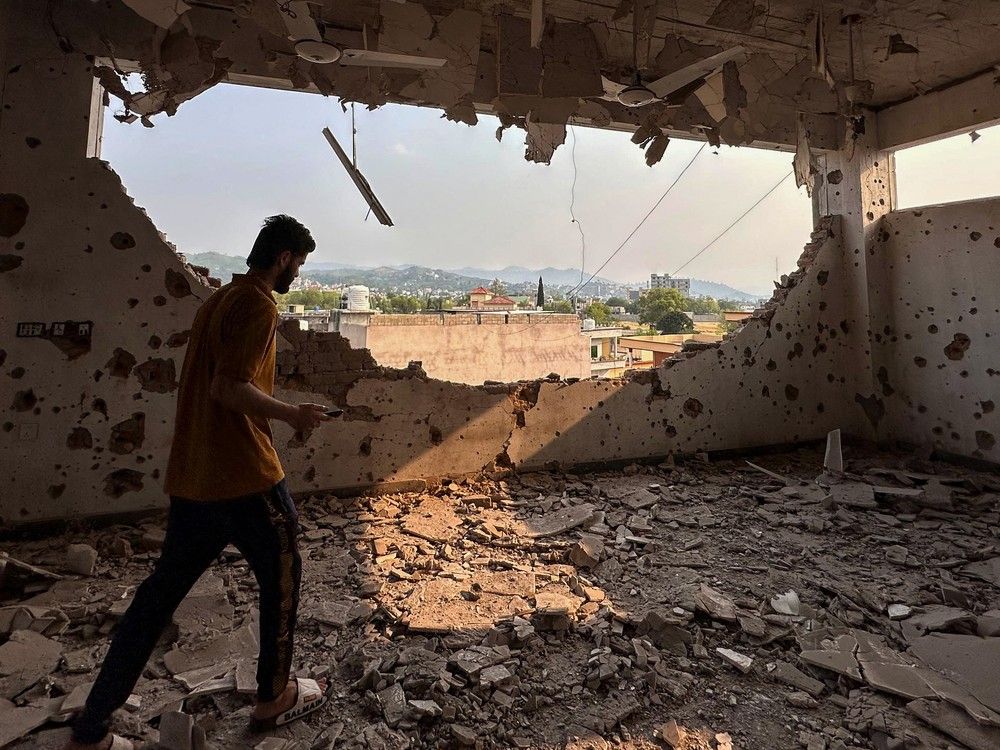NextImg:The Latest: India fires missiles into Pakistani-controlled territory, killing at least 26
