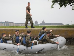 U.S. Naval Academy freshman paddle boats