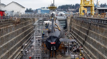 HMCS Corner Brook sits in dry dock at CFB Esquimalt in Esquimalt B.C., in December 2023.
