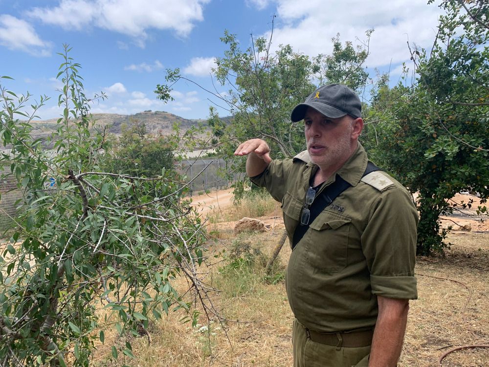  Yaki Shalom, head of the security team for Kibbutz Hanita, stands in the community’s outdoor amphitheatre and near its direct border with Lebanon.