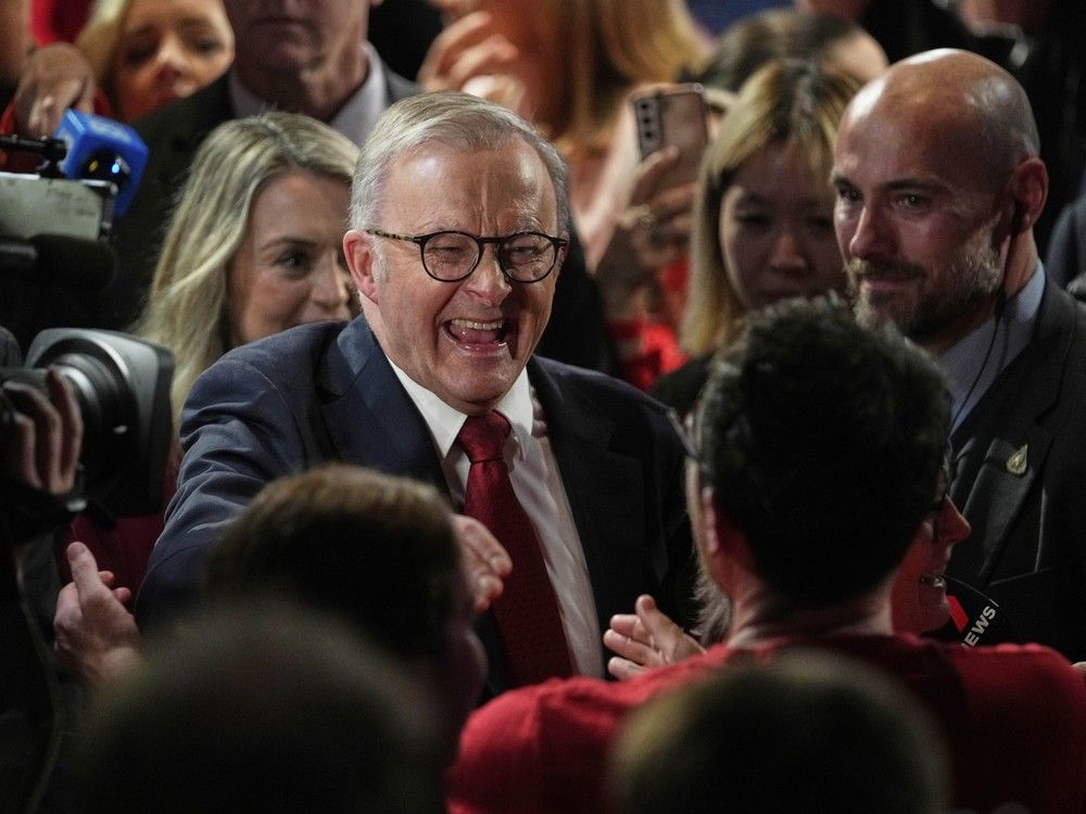 Australian Prime Minister Anthony Albanese reacts as he meets party faithful after winning a second term of the general election in Sydney, Saturday, May 3, 2025. Australian Prime Minister Anthony Albanese reacts as he meets party faithful after winning a second term of the general election in Sydney, Saturday, May 3, 2025.