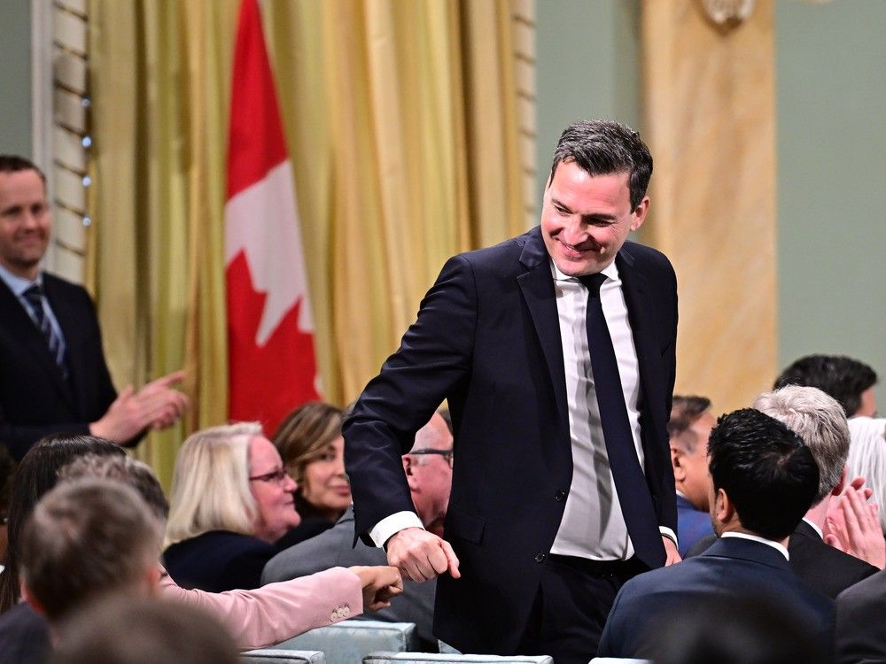 Evan Solomon fist bumps a guest as he heads to be sworn in as Minister of Artificial Intelligence and Digital Innovation and Minister responsible for the Federal Economic Development Agency for Southern Ontario during a cabinet swearing-in ceremony at Rideau Hall in Ottawa on Tuesday, May 13, 2025. Evan Solomon fist bumps a guest as he heads to be sworn in as Minister of Artificial Intelligence and Digital Innovation and Minister responsible for the Federal Economic Development Agency for Southern Ontario during a cabinet swearing-in ceremony at Rideau Hall in Ottawa on Tuesday, May 13, 2025.