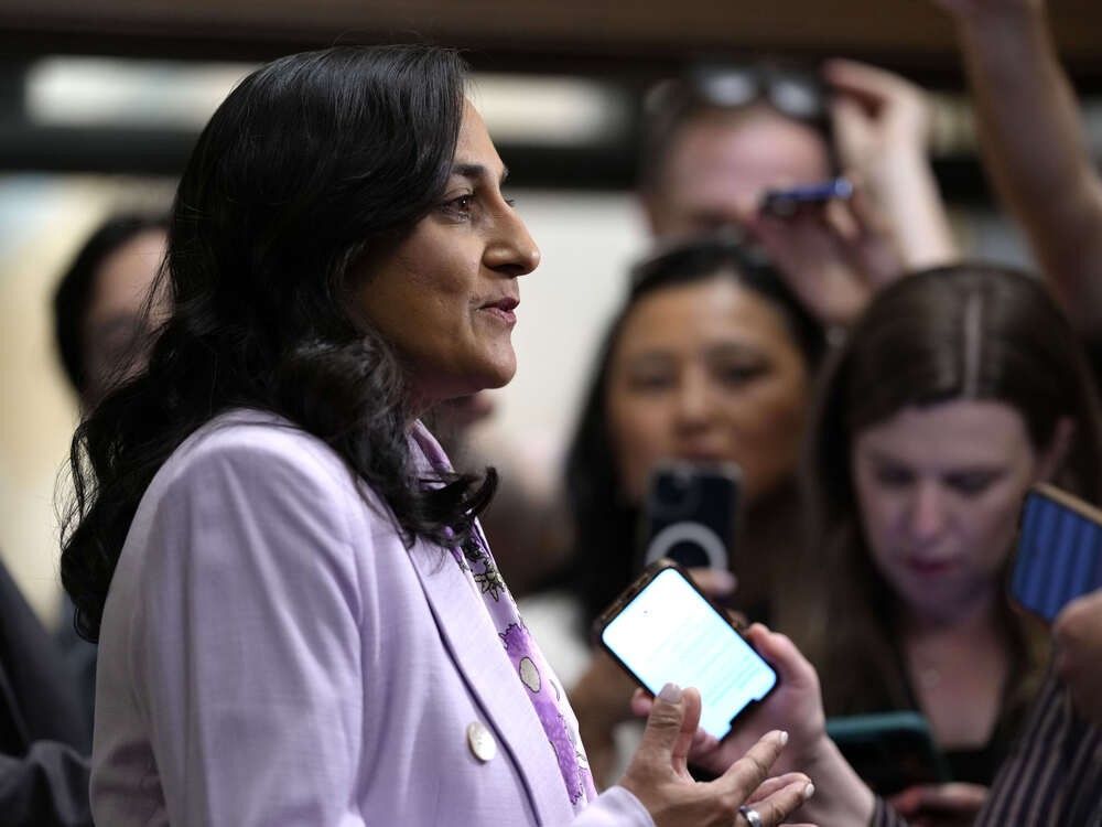 Minister of Foreign Affairs Anita Anand speaks to journalists as she arrives for a meeting of the federal cabinet in West Block on Parliament Hill in Ottawa on Wednesday, May 14, 2025.