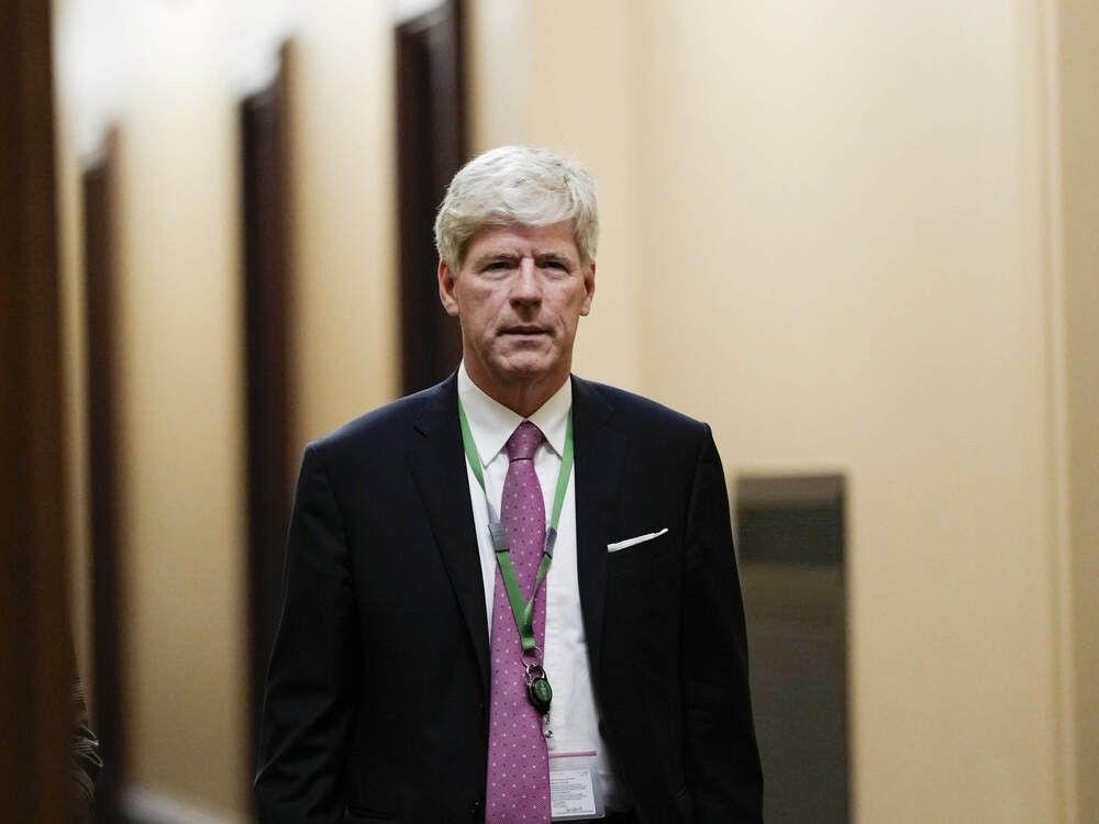 Minister of Energy and Natural Resources Tim Hodgson arrives for a meeting of the federal cabinet in West Block on Parliament Hill in Ottawa on Wednesday, May 14, 2025.