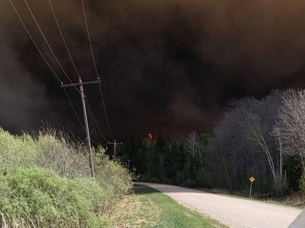 NextImg:Manitoba wildfires: Rain offers some help for crews battling deadly fires