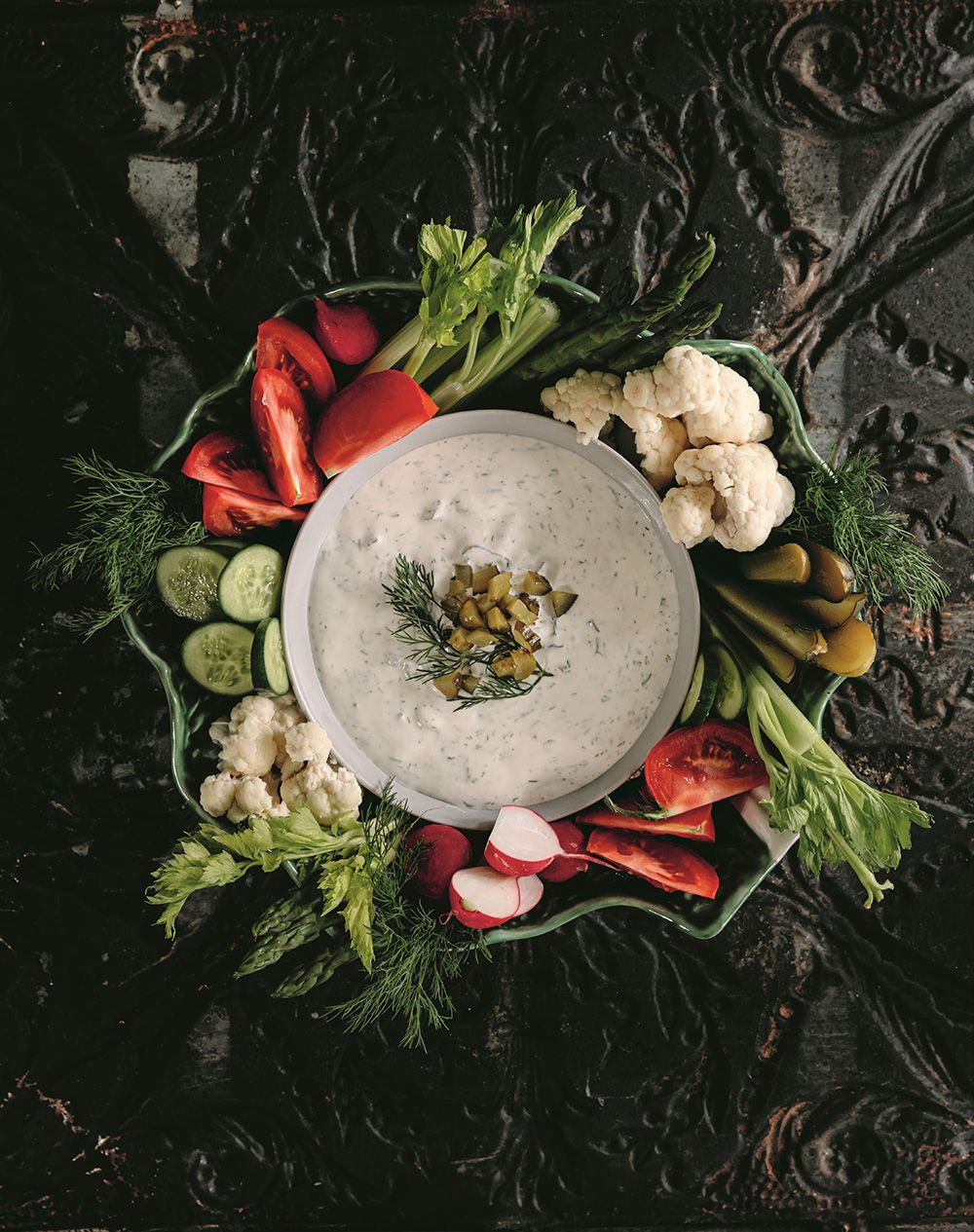  Yes, you can use it to dip chips, crackers, and veggies, but you can also slather it on a tomato sandwich or use it to top a baked potato or to dress a simple green salad,” writes Andrea Buckett of her ‘dill-icious’ pickle dip. 
