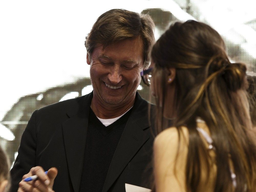  Wayne Gretzky meets fans as he signs autographs of his book at a book signing at West Edmonton Mall in Edmonton, Alberta on Monday, October 24, 2016.