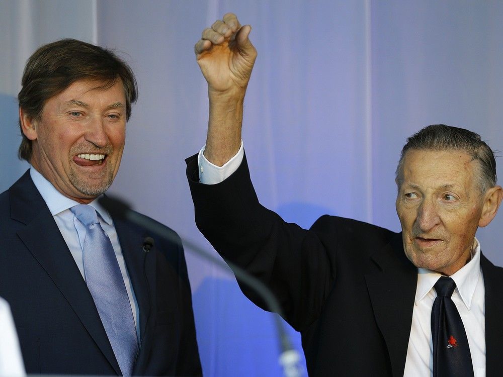 Retired NHL hockey player Wayne Gretzky (left) and his father Walter Gretzky (right) at the University of Alberta Hospital in Edmonton on Tuesday October 3, 2017.