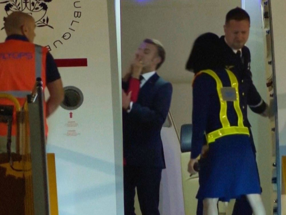 NextImg:France's Macron dismisses video of apparent shove from wife, says they were 'horsing around'