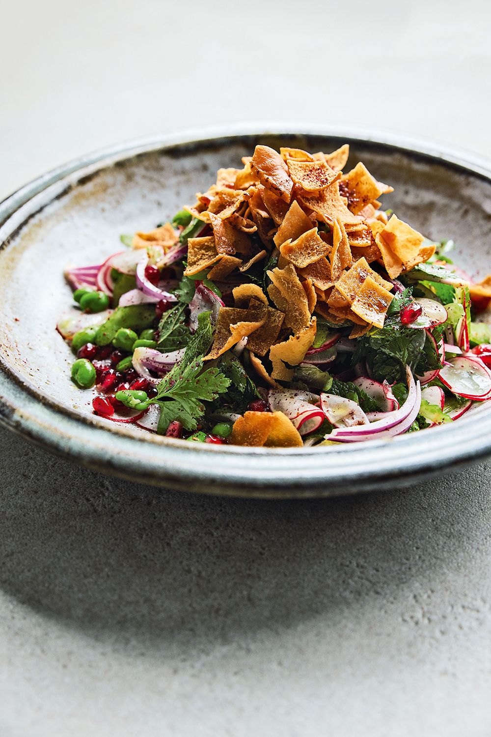  “I love to turn this salad into a full meal by adding some crumbled feta, jarred chickpeas or some seared prawns,” Noor Murad writes of her springtime fattoush.