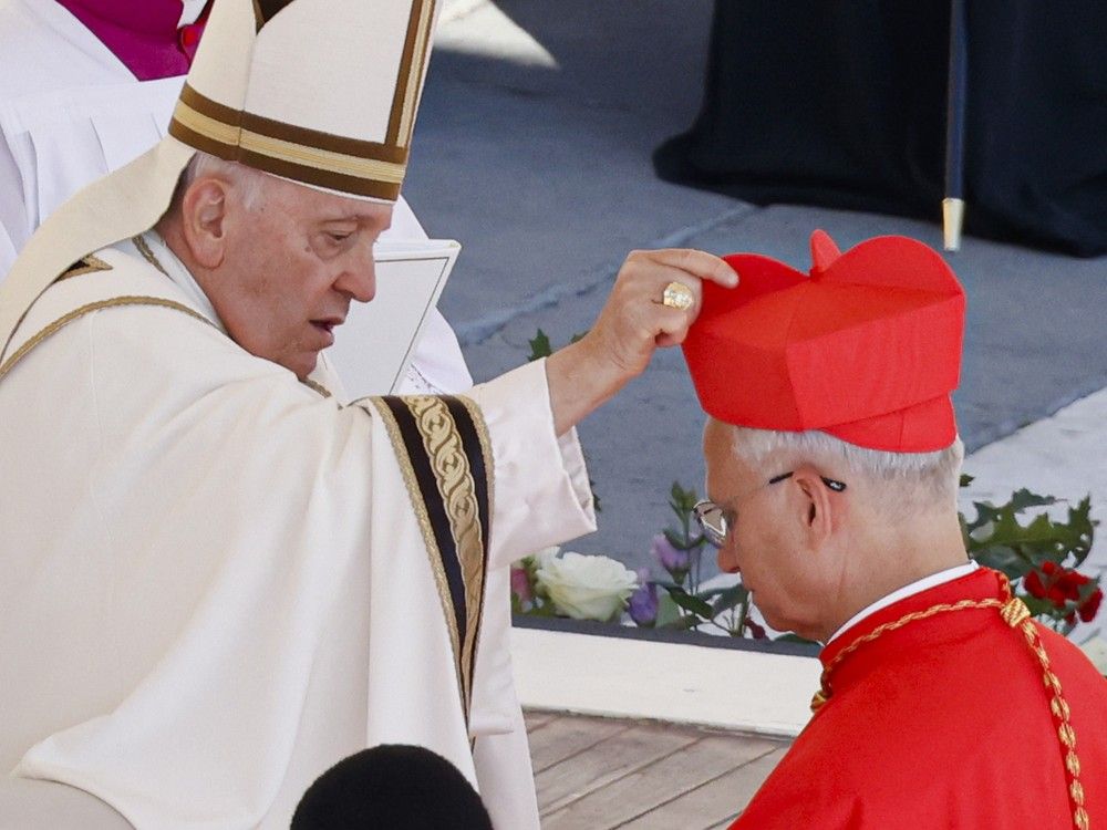 FILE: Newly elected Cardinal Robert Francis Prevost, Prefect of the Dicastery for Bishops, right, receives his biretta from Pope Francis as he is elevated in St. Peter’s Square at The Vatican, Sept. 30, 2023. FILE: Newly elected Cardinal Robert Francis Prevost, Prefect of the Dicastery for Bishops, right, receives his biretta from Pope Francis as he is elevated in St. Peter’s Square at The Vatican, Sept. 30, 2023.