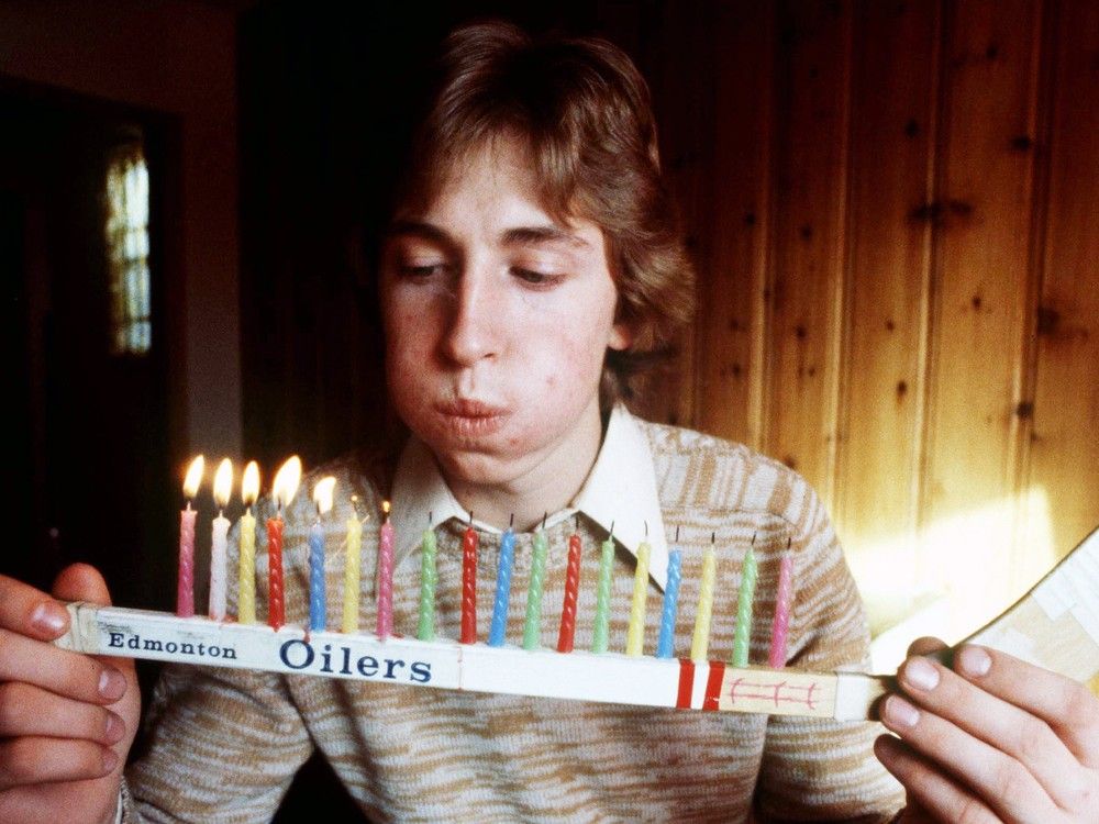  FILE: Wayne Gretzky blows out candles to celebrate his 18th birthday while a member of the Edmonton Oilers of the World Hockey Association.