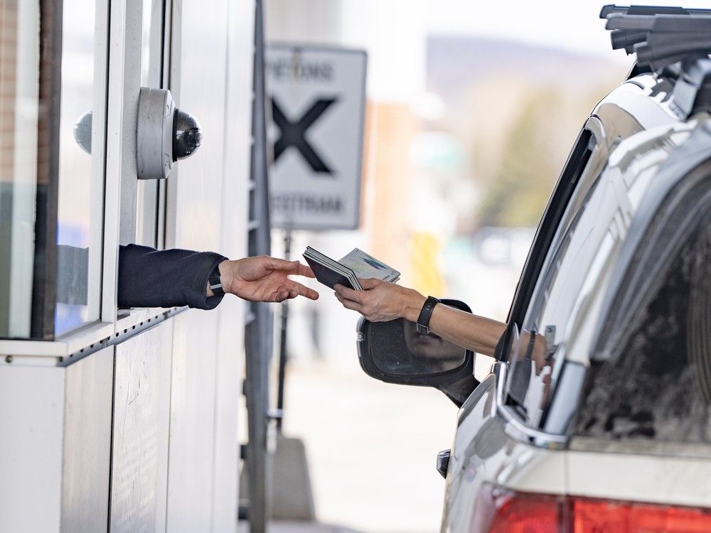NextImg:Canadian air and auto travel to the U.S. drops again in May, overseas trips increase
