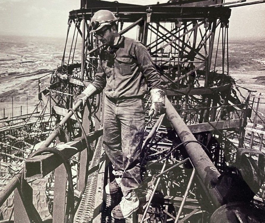 Working atop the Superstack afforded great views and a more casual approach to safety gear than would be permitted today. Andre Gallant of Val Caron, captured in this iconic image, says he was always felt comfortable working at heights. Working atop the Superstack afforded great views and a more casual approach to safety gear than would be permitted today. Andre Gallant of Val Caron, captured in this iconic image, says he was always felt comfortable working at heights.