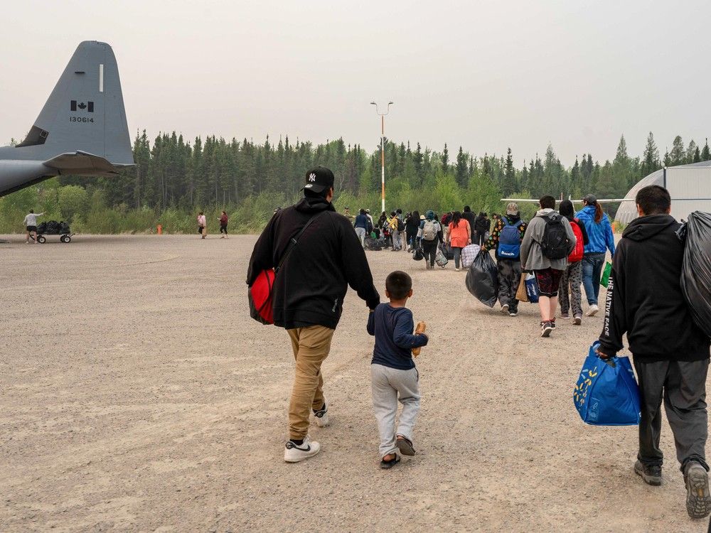 The Royal Canadian Air Force helps transport evacuees out of Norway House, Manitoba, due to wildfires in Northern Manitoba on May 31, 2025.  The Royal Canadian Air Force helps transport evacuees out of Norway House, Manitoba, due to wildfires in Northern Manitoba on May 31, 2025.