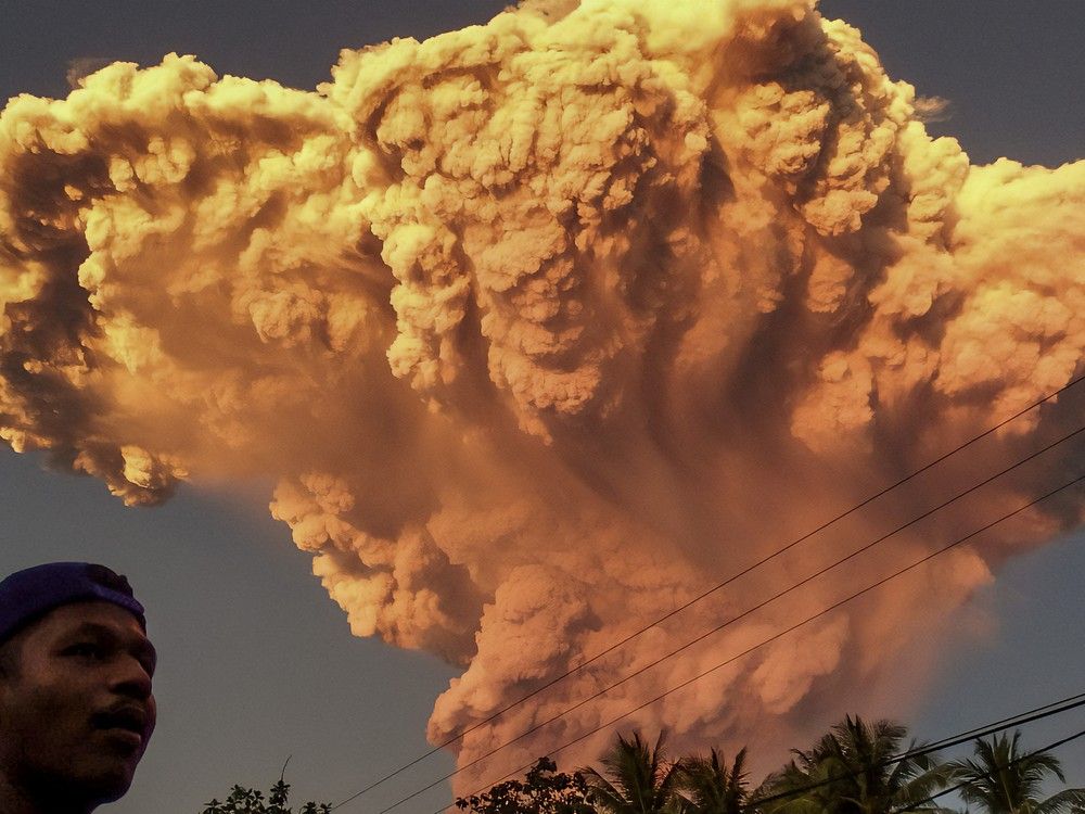 NextImg:Volcano in Indonesia erupts forcing evacuations and flight cancelations