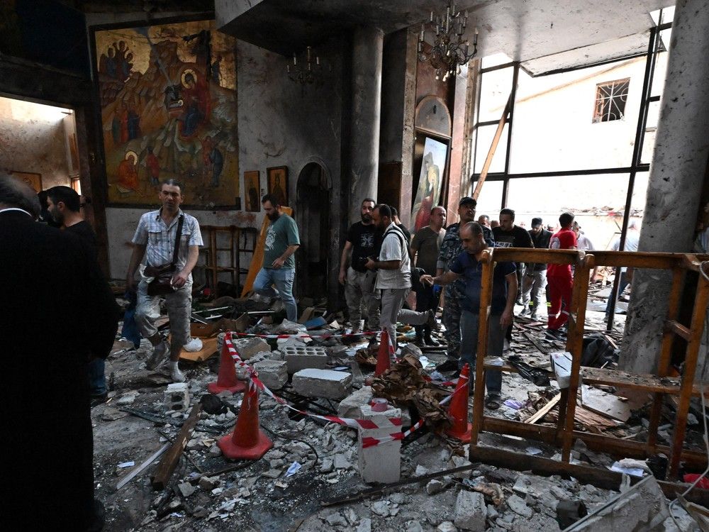 NextImg:At least 20 killed in suicide bomber attack during service at Syrian Greek Orthodox church