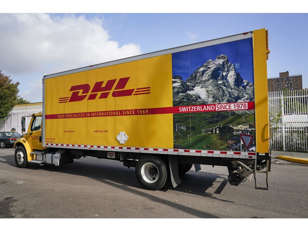 NextImg:Another delivery system disruption as DHL Express Canada locks out workers and union strikes
