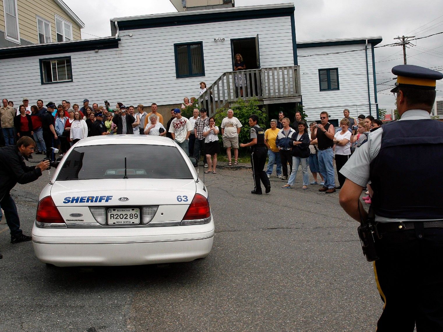 Angry residents shout obsenities as Penny Boudreau is led from court to a waiting car after her appearance in Karissa’s 2008 murder in Bridgewater, N.S. Angry residents shout obsenities as Penny Boudreau is led from court to a waiting car after her appearance in Karissa’s 2008 murder in Bridgewater, N.S.